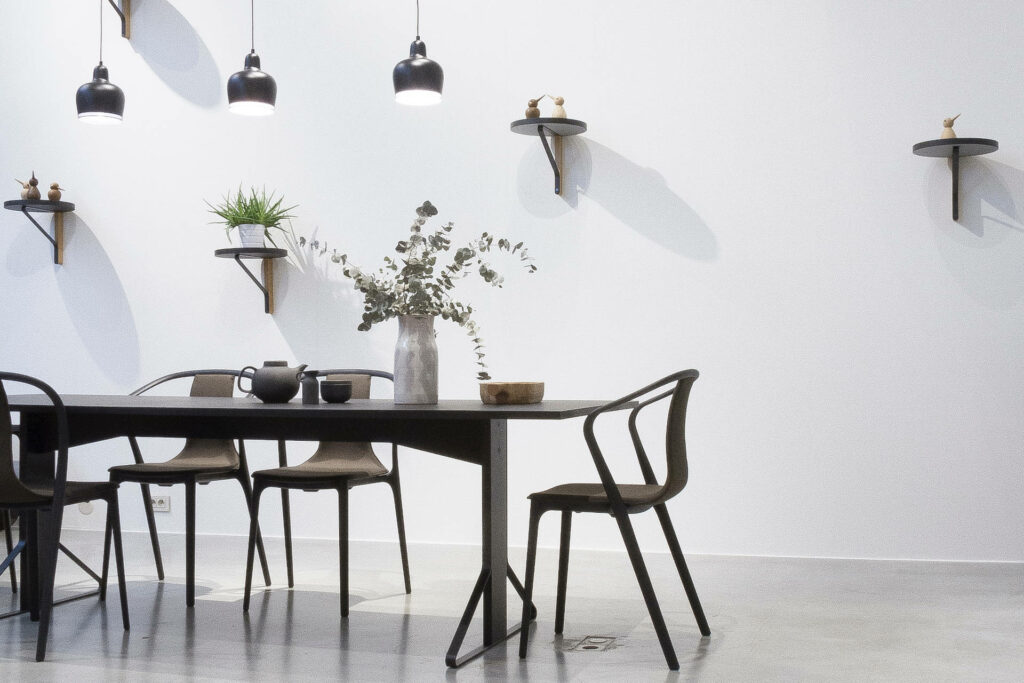 Black dining set in a light room
