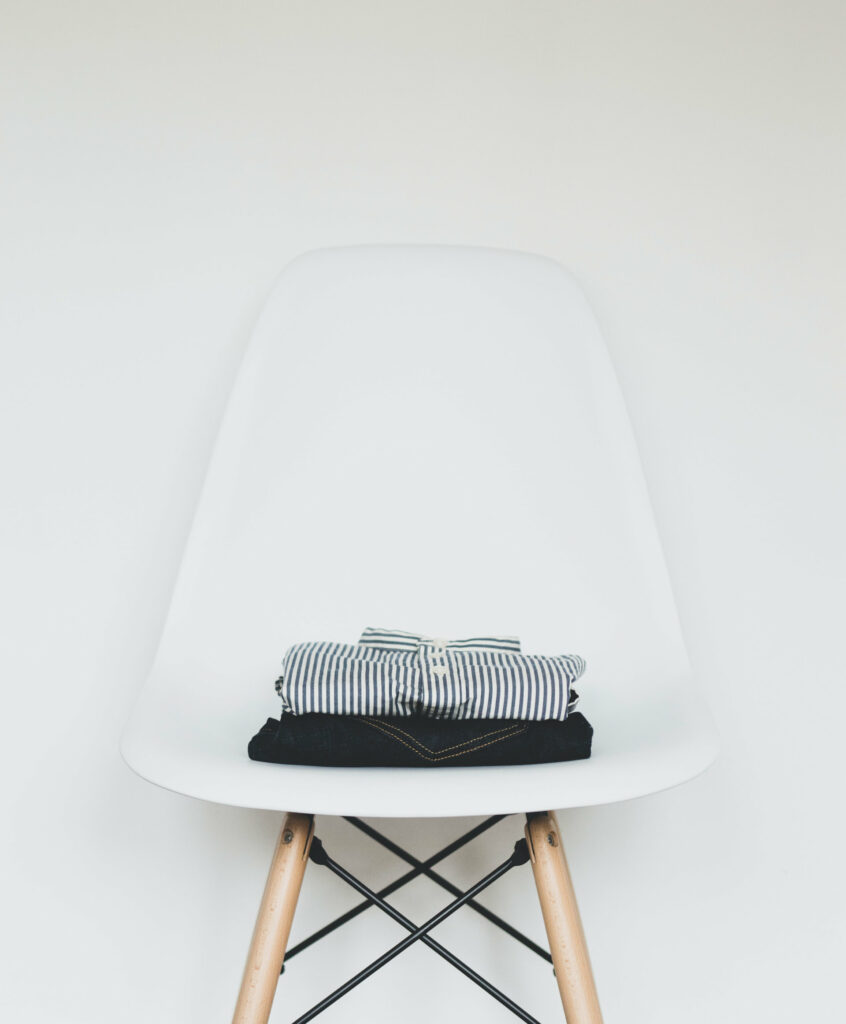 Black and white striped shirt with jeans on the chair