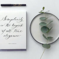 Flatlay arrangement with writing pad